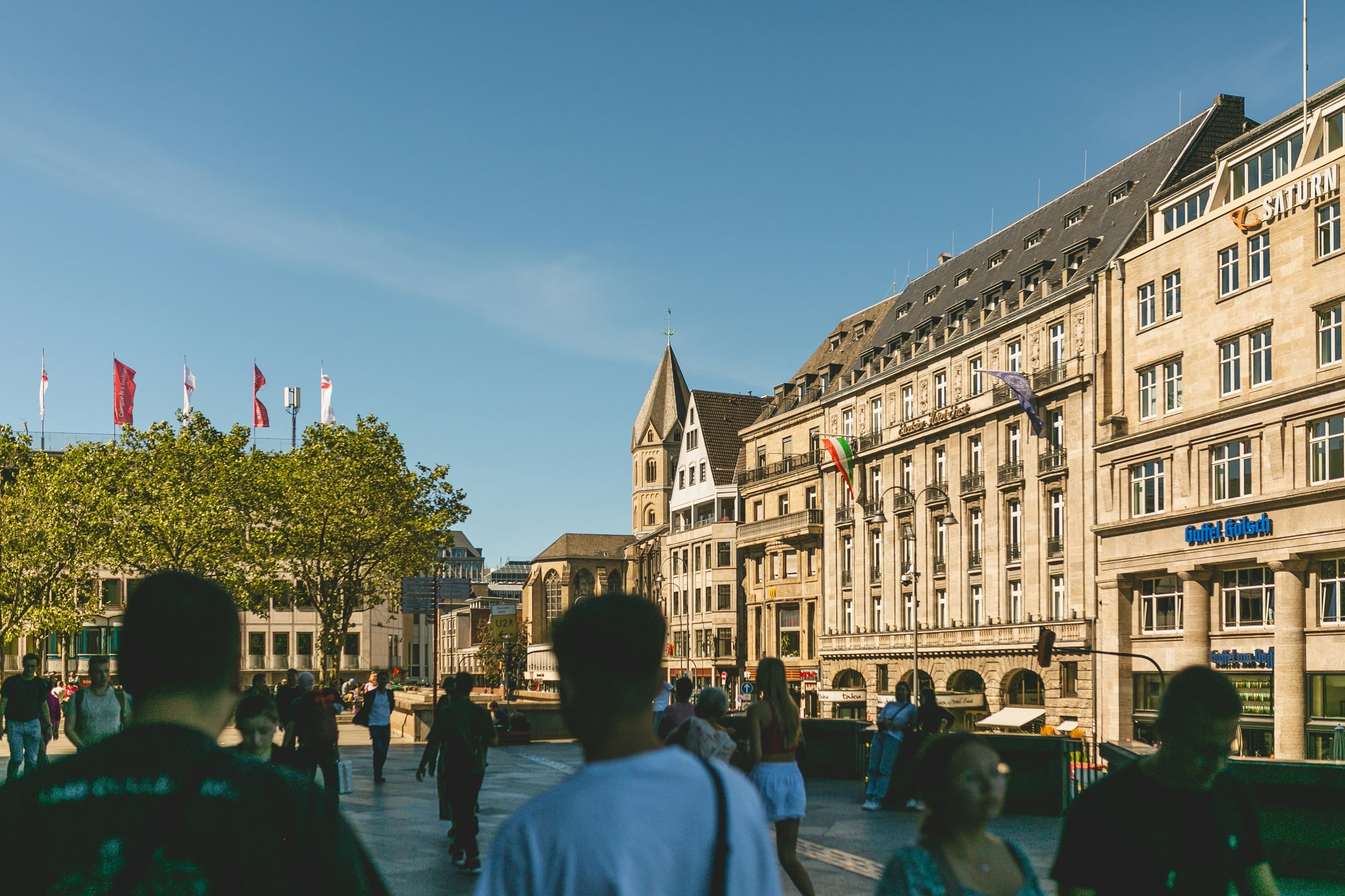 Students walking through a university city square